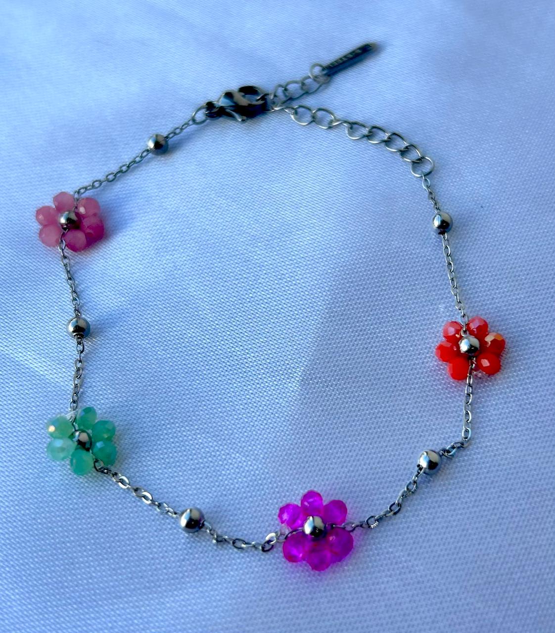 Pulsera con flores de cristal de colores