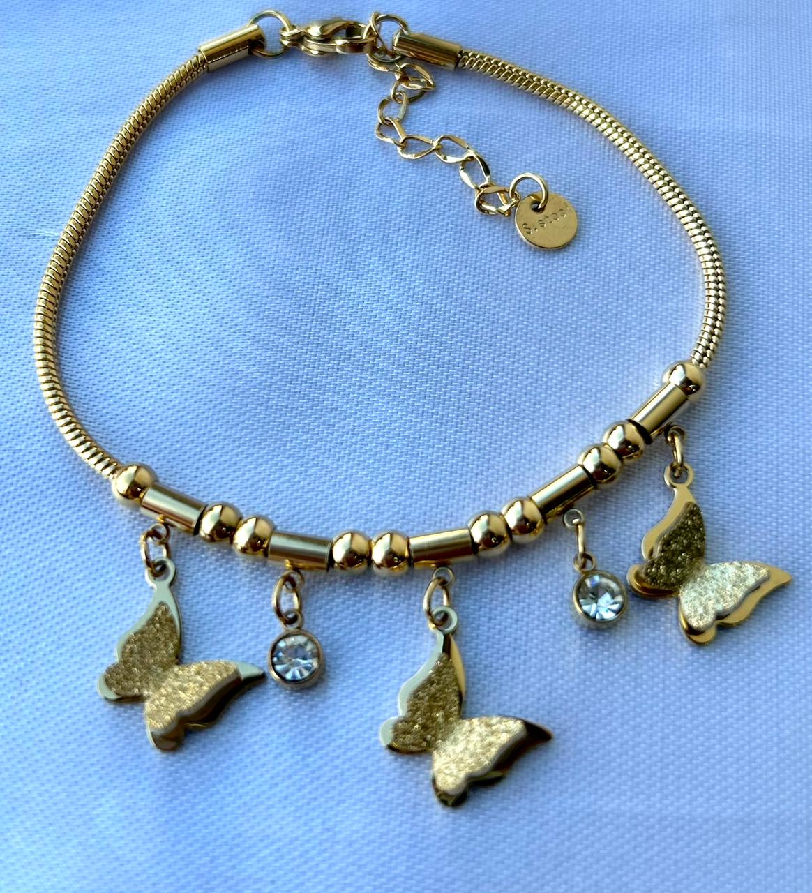 Brazalete tubular con mariposas y cristales