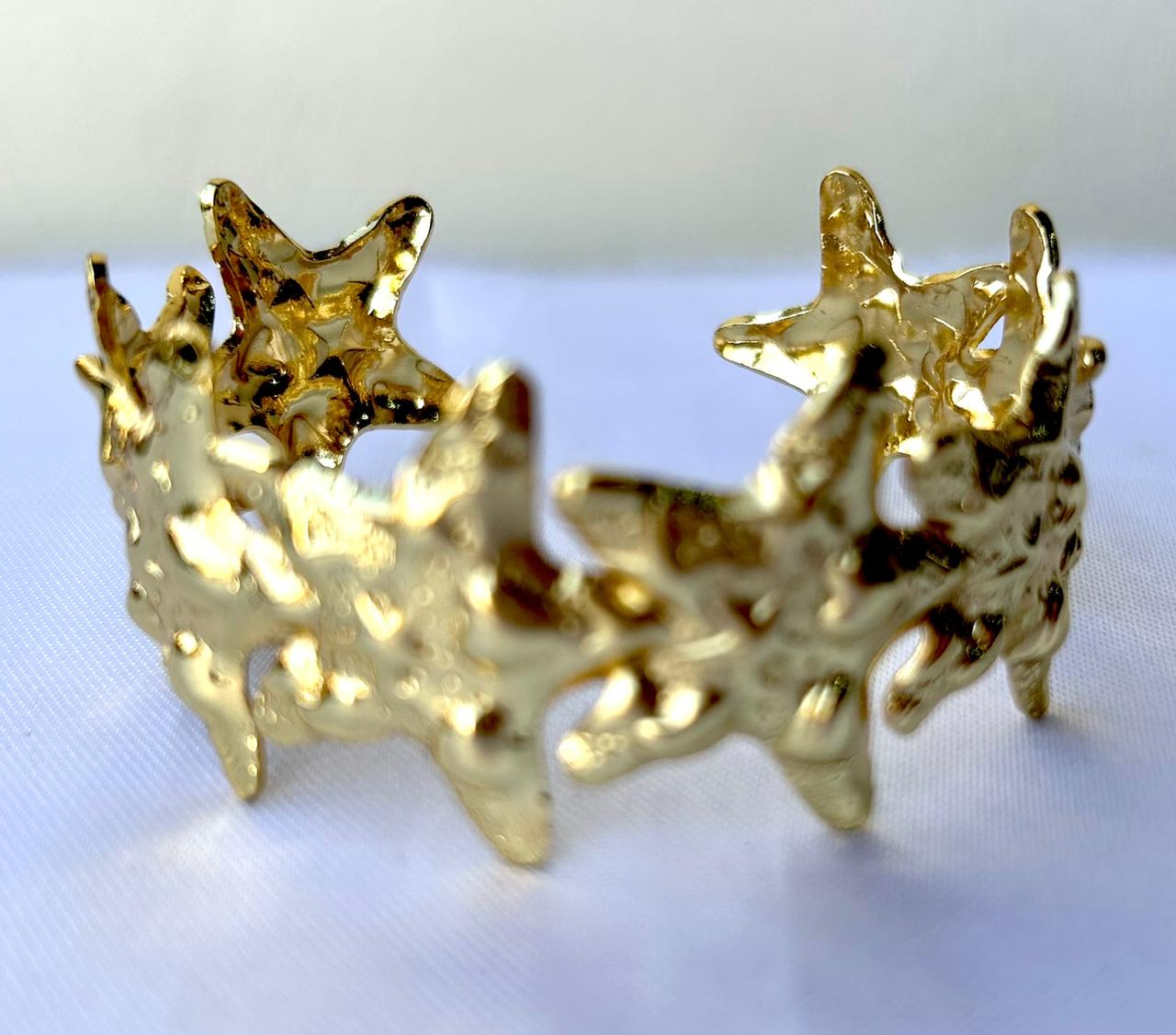 Brazalete dorado estrellas de mar gruesas